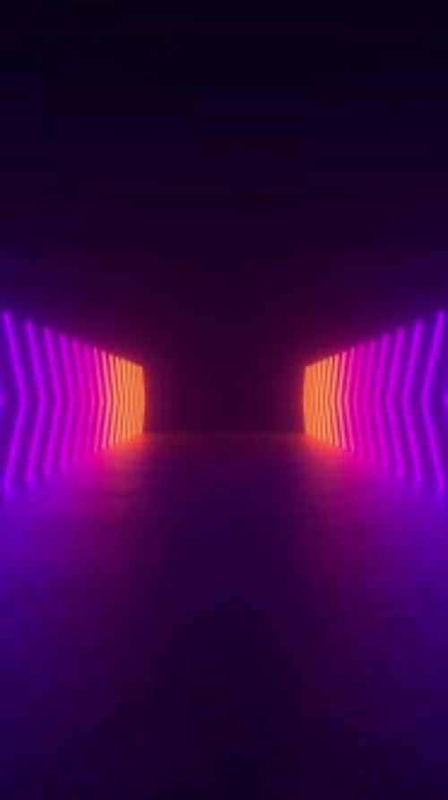 Experience a neon light tunnel in a dark room with glowing lines and shapes on a concrete floor.