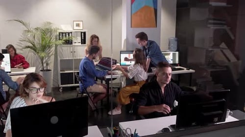 Wide Angle View Of Busy Design Office With Workers At Desks Team Job Young Businessmans Crew Working