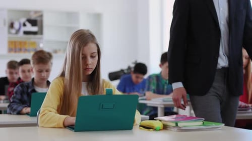Students Actively Engage in Educational Learning Sessions While Utilizing Laptops for Their Studies
