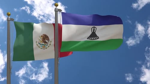 Waving Flags of Mexico and Lesotho in Realistic Sky