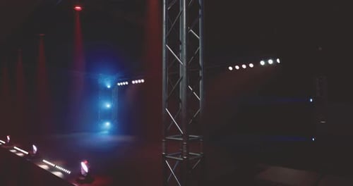 Colorful Stage Lighting Illuminates a Theater Setup for an Event