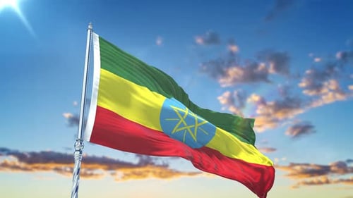 Realistic Ethiopian Flag Waving Against a Sunset Sky