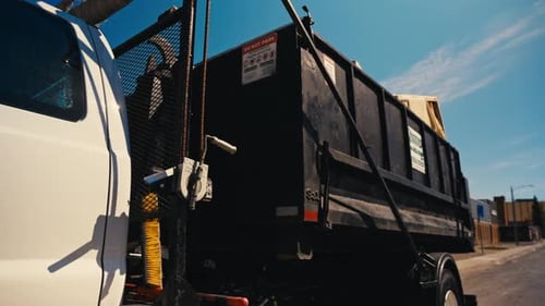 Commercial dump truck in urban setting
