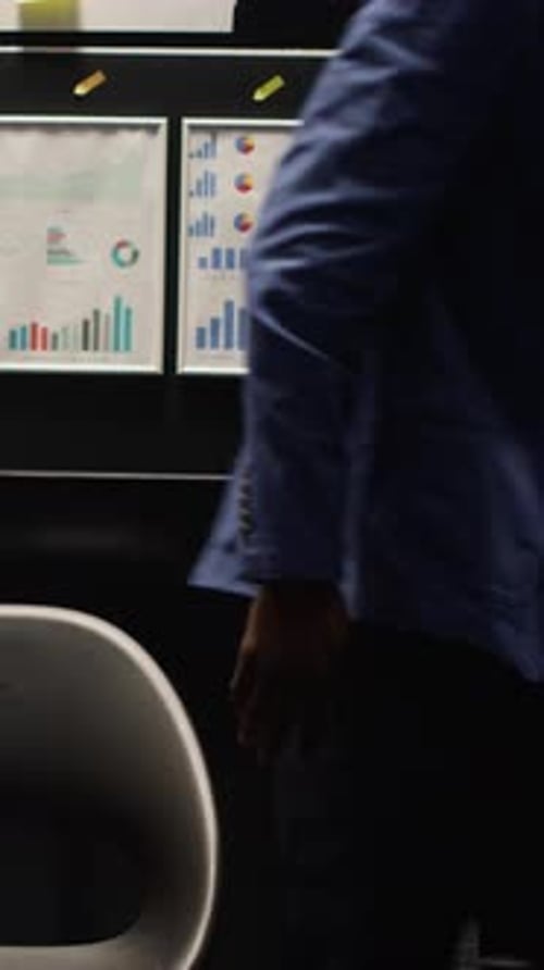 Adult Working in Dark Office at Night