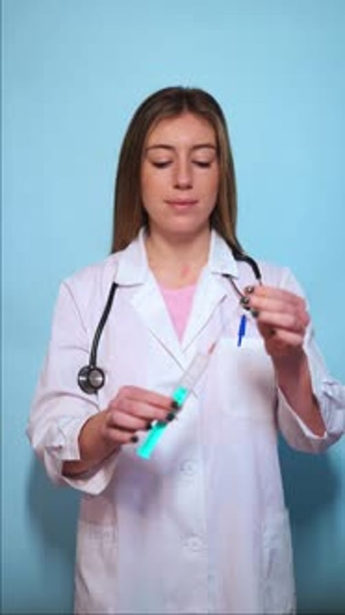 Medical Professional with Syringe in Hospital Setting