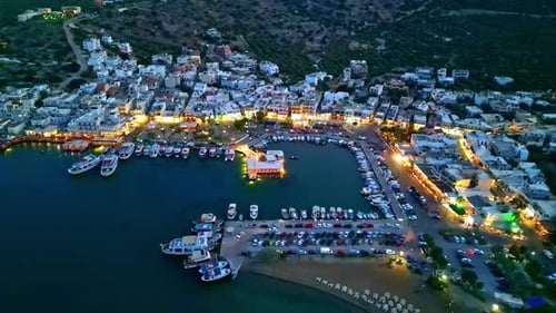 Aerial View Of Port of Elounda At Sunset In Eastern Crete, Crete, Greece, Europe.