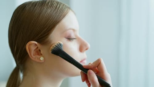 Makeup Artist Work in Her Beauty Studio Portrait of Woman Applying By Professional Make Up Master