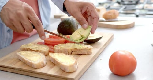Avocado Toast Preparation in Bright Kitchen