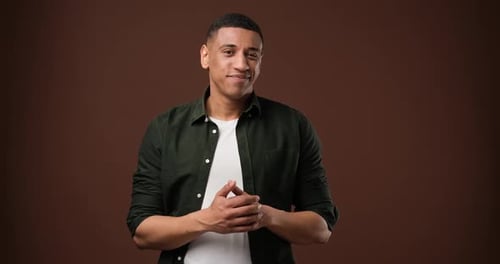 Upset Unhappy African American Manrub Hands and Showing Thumbs Down Sign Gesture Expressing Dislike