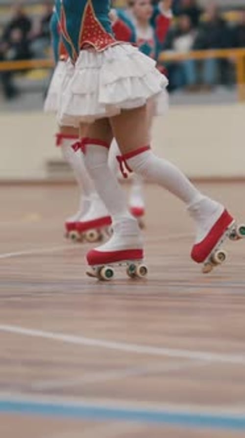 Teenage Girls on Roller Skates with Elaborate Costumes