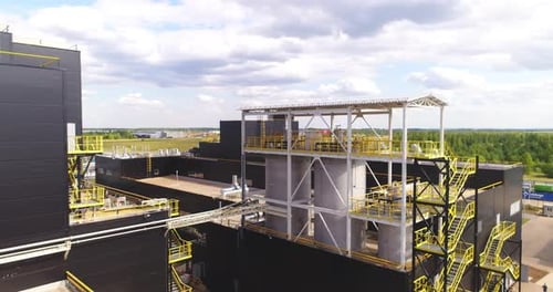 Workshop Building and Tanks Connected with Pipes at Plant