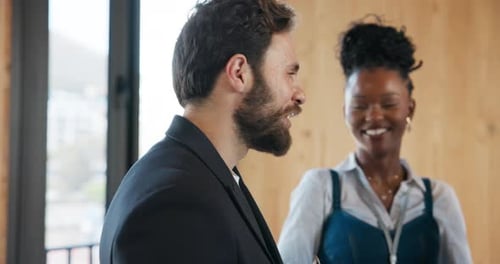 Business People in Office Having a Conversation