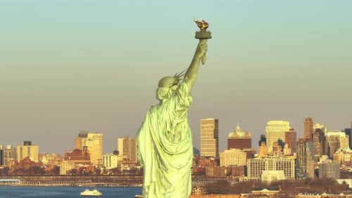 Aerial view of the Statue of Liberty against a blue sky