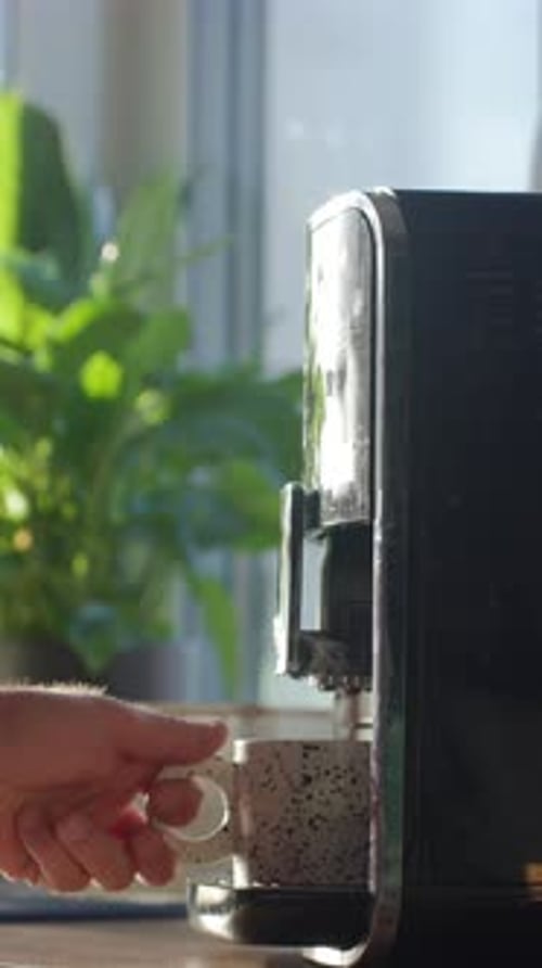 Coffee Machine Fills Mug in Sunny Home Interior
