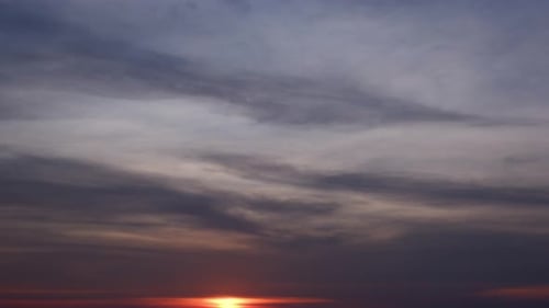 Colorful Sunset Clouds Time-Lapse over Horizon