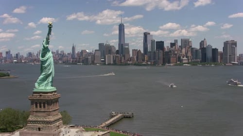 New York City, New York Circa-2017, Flying by Statue of Liberty Towards
