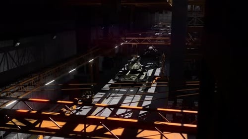Char militaire dans un hangar de fabrication