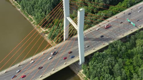 Modern cable stayed bridge and car traffic on background. Highway traffic jam. Aerial View