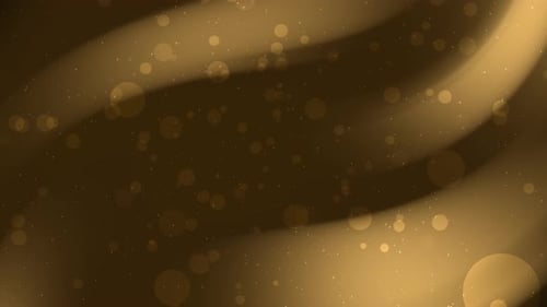 Gold Gradient Background With Bright Specks