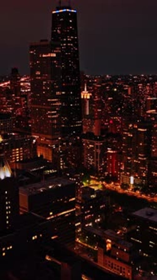 View of Chicago's skyline illuminated at night from above