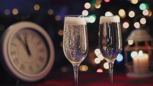 Celebratory Champagne with Holiday Lights and Candle