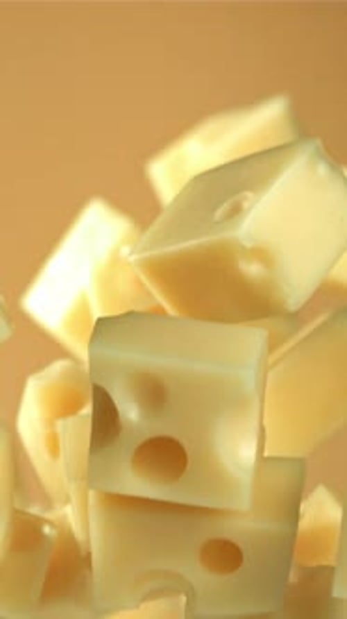 Super Slow Motion Pieces of Cheese on Black Background Filmed on a Highspeed Camera at 1000 Fps