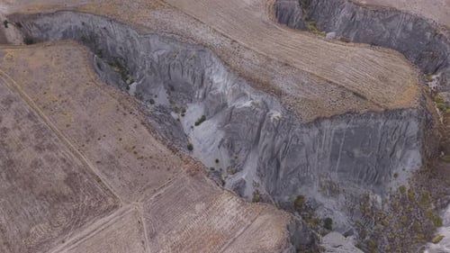 Agricultural Terraces Hugging Rugged Canyon Walls Expansive Andean Highland Topography with Aerial