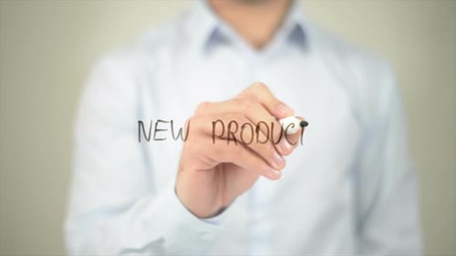 New Products Man Writing on Transparent Screen