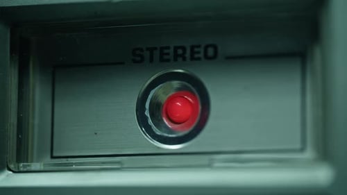 Closeup Stereo System Indicator Lamp Illuminated in Studio Sound Technology
