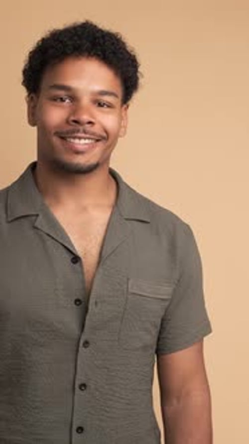 Handsome Young Adult Posing and Smiling