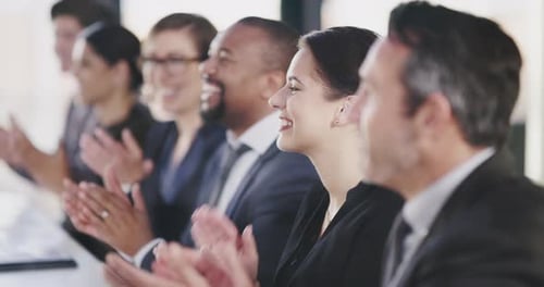 Group of Professionals Clapping at Corporate Meeting