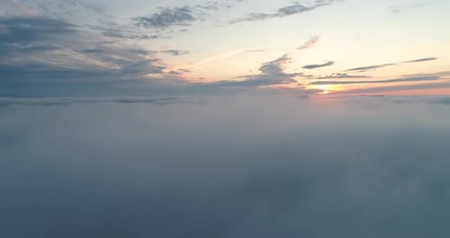 Aerial View of Clouds at Sunset