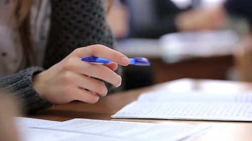 High School Teenage Students at the Desk