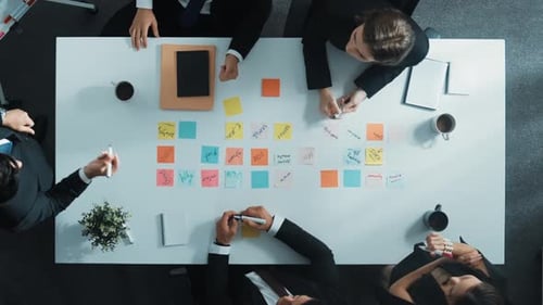 Top view of business people discuss and share marketing strategy. Directorate.