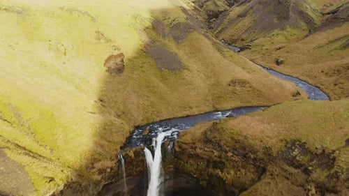 Aerial of Spectacular Kvernufoss Waterfall Picturesque Scenery of South Iceland