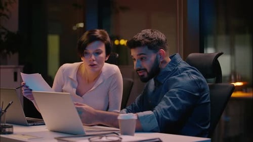 Indian Man Caucasian Woman Working Together at Dark Night Office Multiethnic Business Colleagues