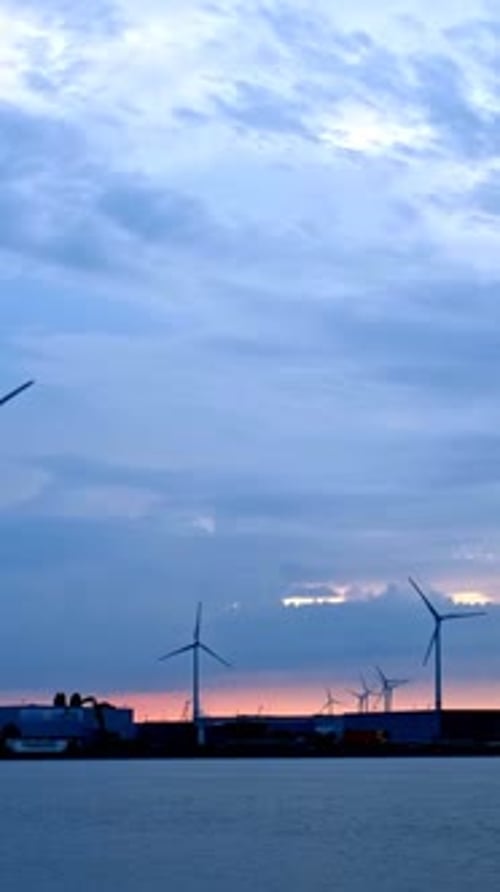Wind Turbines in Antwerp Port on Sunset