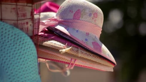 Display of straw hats in a market, summer