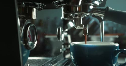 Espresso Pours Into Cup From Coffee Machine