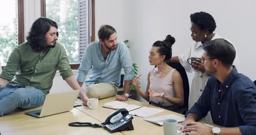 Team Working Together in Office Environment