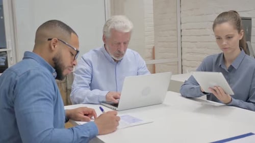 Busy Multiracial People Working in Office