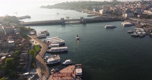 Aerial Tracking Shot of Ferry Boat in Golden Horn at Galata Bridge, Istanbul, Turkey