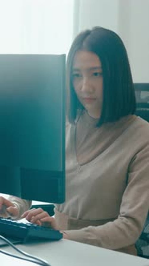 Young Asia female freelance typing write prompt AI bot IT app program nomad in office.