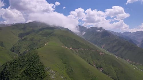 Alpine Meadows And Cloudy Blue Sky