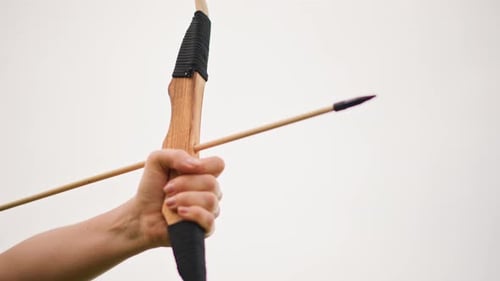 Handcrafted Bow with Focused Shot Skillful Archer Drawing Bow Against Calm Sky Setting Dedicated