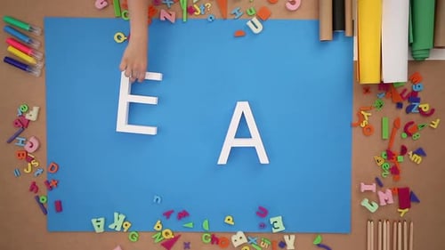 People Forming Create Text Alphabet