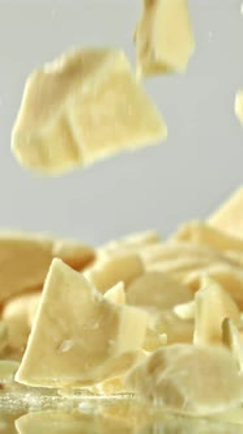 Super Slow Motion Pieces of White Chocolate Filmed on a Highspeed Camera at 1000 Fps