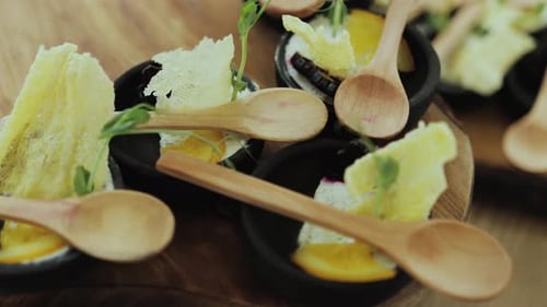 Elegant Appetizers with Wooden Spoons on Display