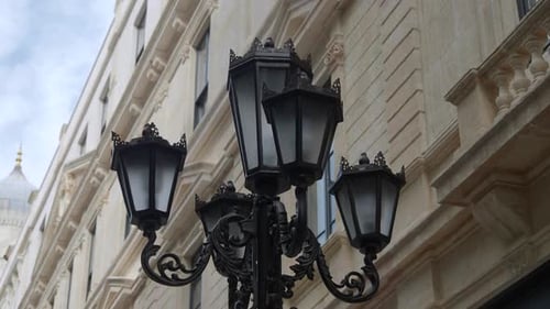 Elegant Street Lamp Surrounded By Buildings