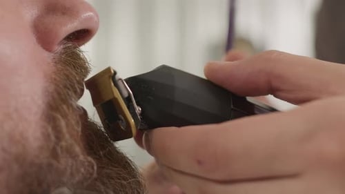 Close-up of Man's Beard Trimmed with Electric Trimmer